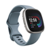 Fitbit Versa 4 fitness smartwatch with Waterfall Blue silicone band and platinum aluminum case