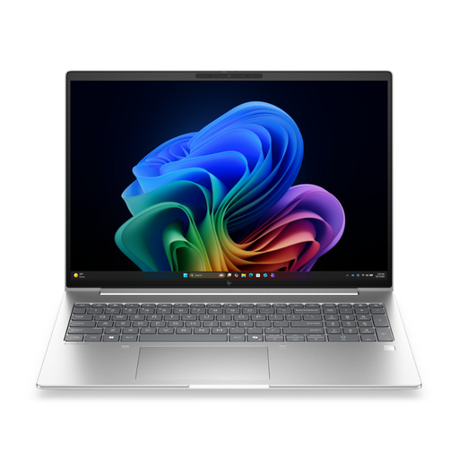 Silver laptop with keyboard and colorful Windows wallpaper on the screen