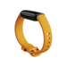 Fitbit Inspire 3 Morning Glow side view, orange band with black tracker housing